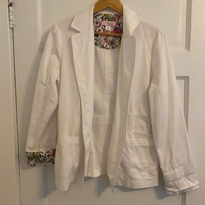 White womens lab coat. Size medium. Floral detail when sleeves are rolled up.